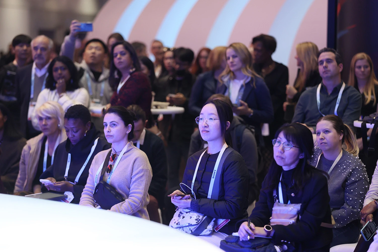 Audience attending a CES stage session, from CES official attendee materials